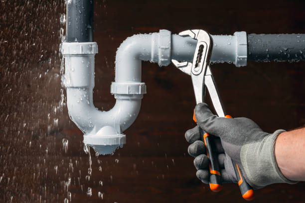 Professional Plumbing technician working in Van Meter, IA
